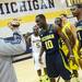 Michigan junior Tim Hardaway Jr. messes with a cameraman during media day at the Player Development Center on Wednesday. Melanie Maxwell I AnnArbor.com